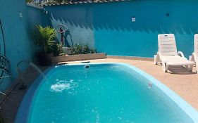 Quarto,cozinha,banheiro e área externa compartilhada